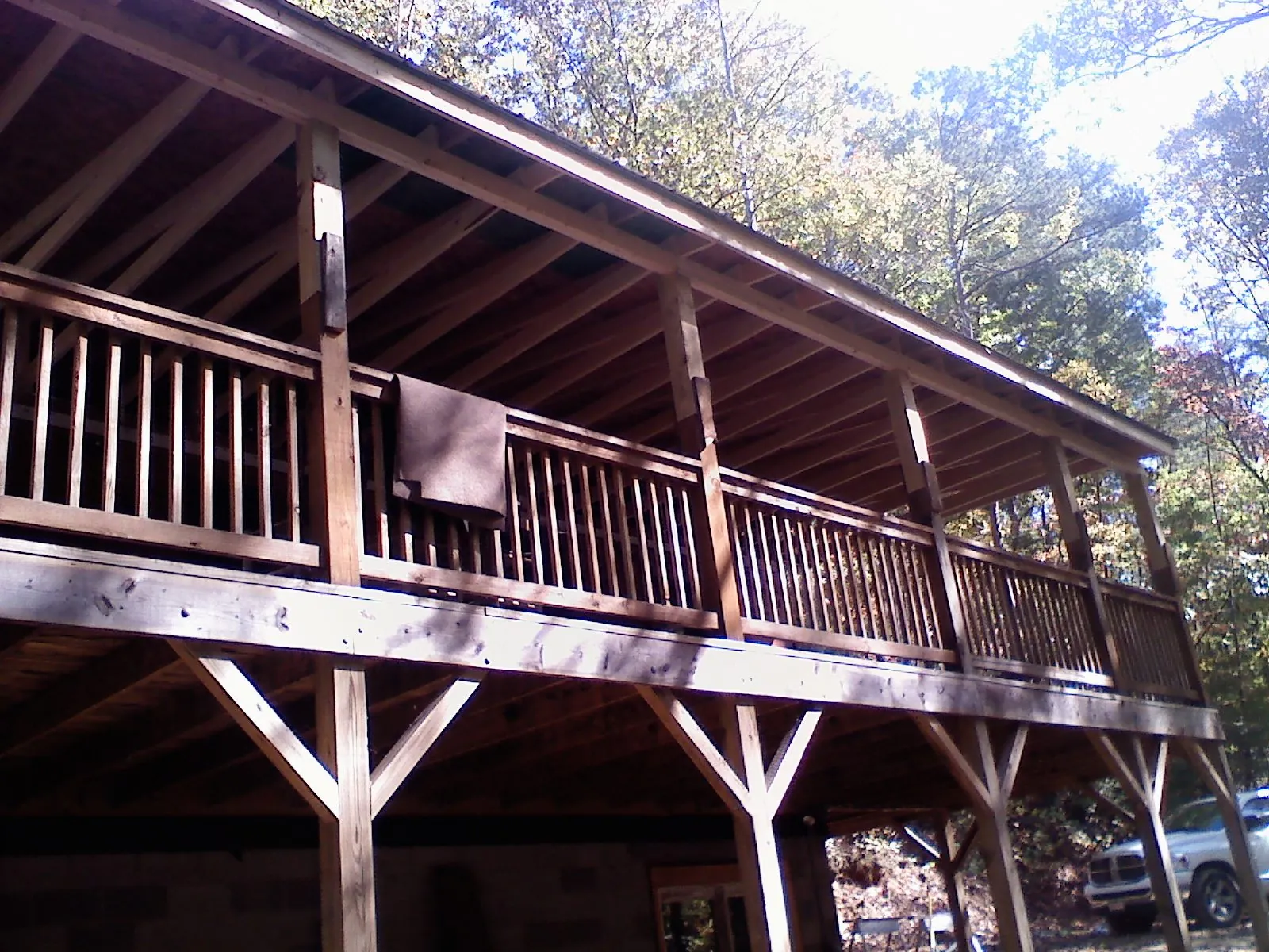 Timber framing under a new elevated porch and deck — Roof Leak Repair in Fullerton by Roofing Brothers